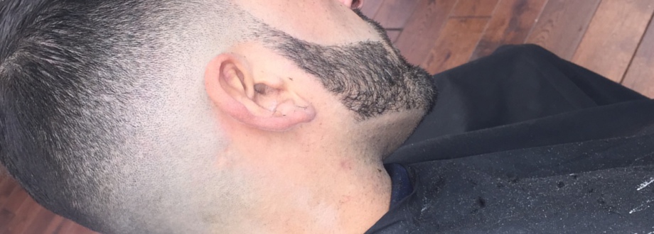 side pick of a beard shape up